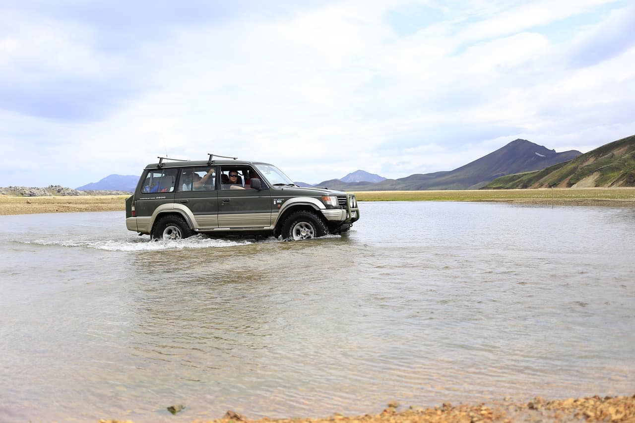 4x4 rental car on a gravel road in the Icelandic interior