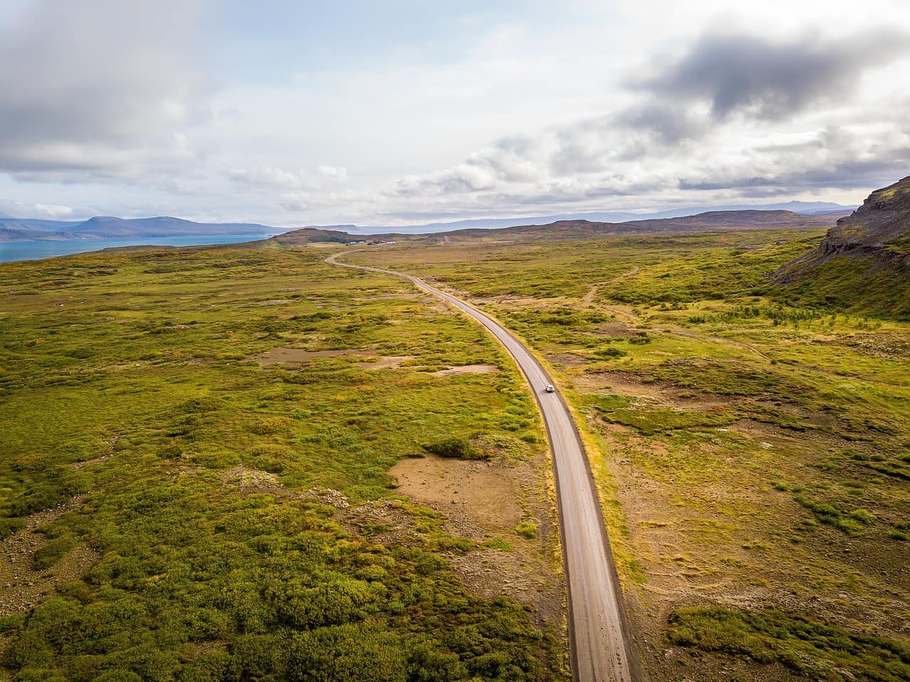 Long empty road through the Icelandic countryside